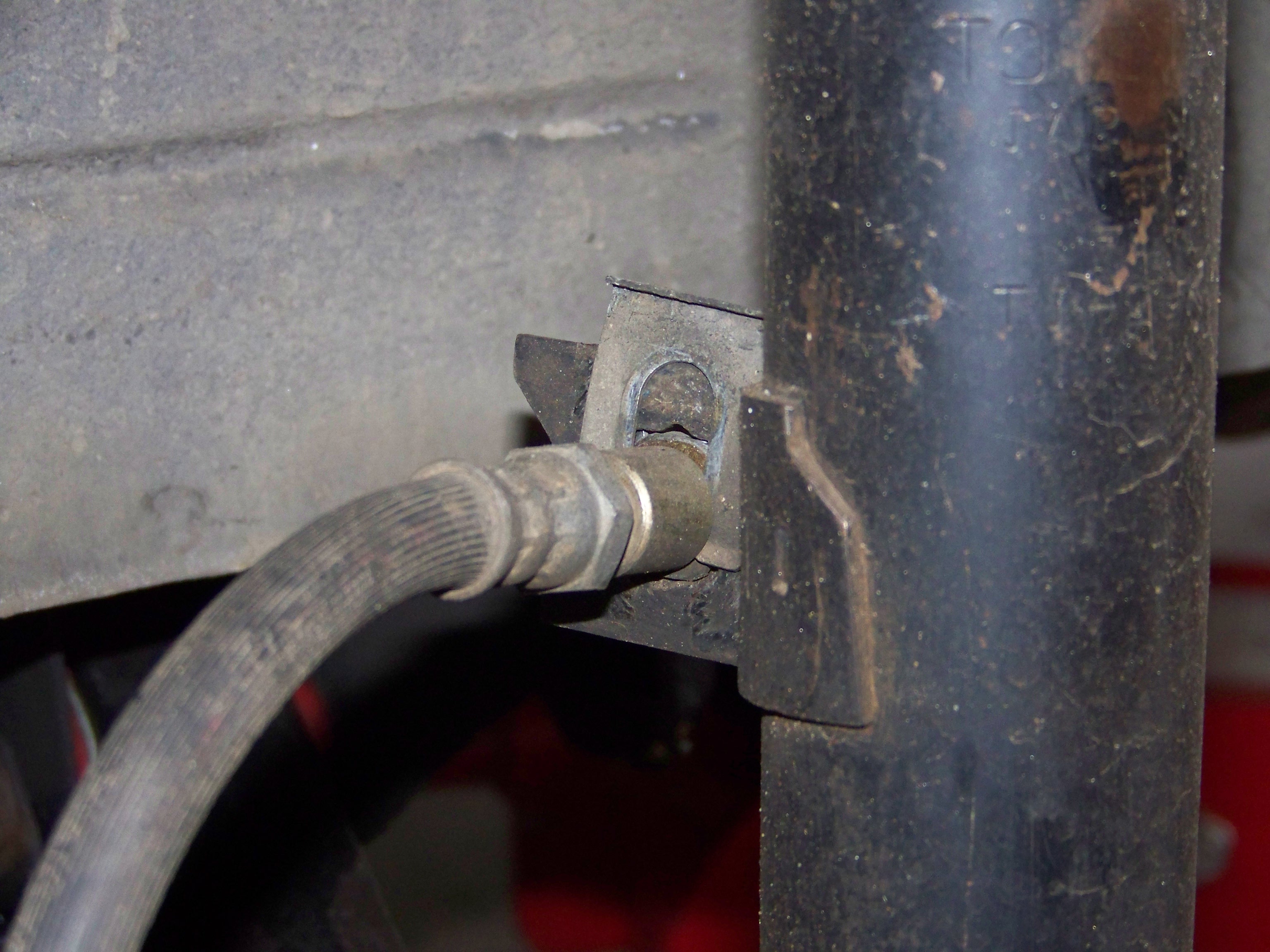 Front Strut/Shock Absorber Removal And Replace. Tech Articles